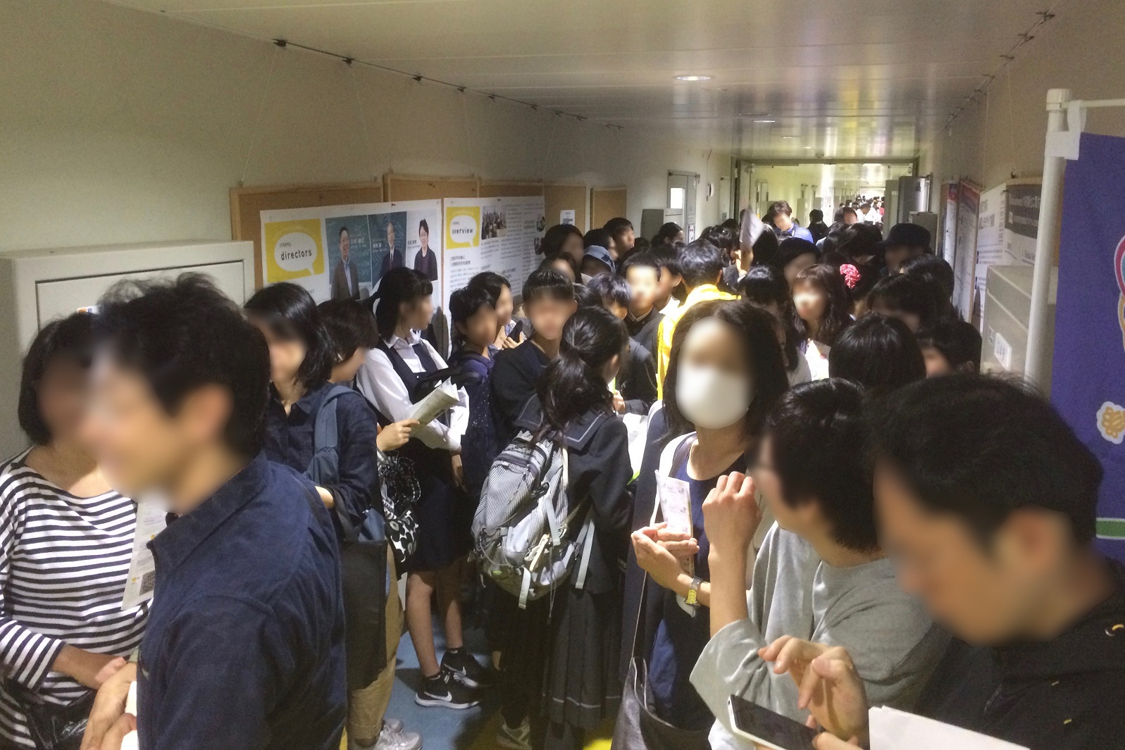 Visitors standing in line for the VR experience at Open Day 2018.